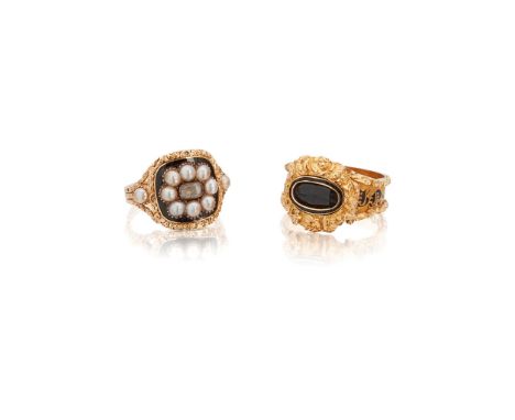 Two early 19th Century mourning rings the first set with a cluster of half pearls on a black enamel ground around a vacant gl