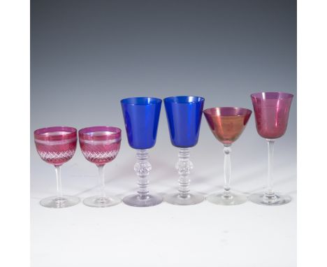 DESCRIPTION: Assorted crystal stem wear. Features a pair of cranberry hued etched crystal sherry glasses with beveled stems, 