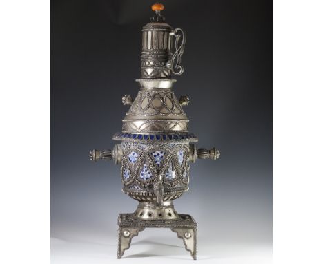 DESCRIPTION: Vintage Morroccan samovar comprising of metal sheets overlaid with coiled metal accents. Finished with handpaint