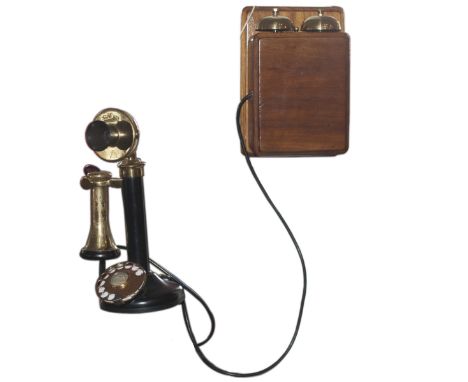 DESCRIPTION: Antique rotary telephone from Empresa Mixta Telefono Argentina. Features a wooden wall bell ringer and a rotary 