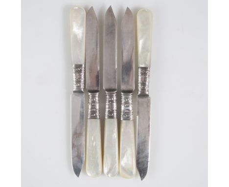 DESCRIPTION: Rogers Bros. sterling and mother of pearl fruit knives. Features a sterling stem connecting the blade and mother