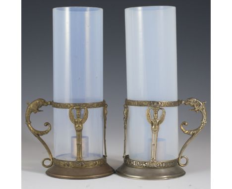 DESCRIPTION: Antique lanterns comprised of a brass outter fitting with a rococo style lion extending from a scrolled leaf alo