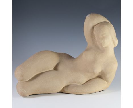 DESCRIPTION: A solid composite sculpture by Museum Pieces Inc. of a woman laying down on her side. Signed: "W. Gregory" along