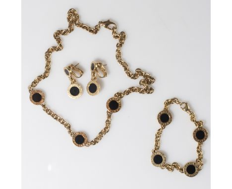 DESCRIPTION:A Bvlgari 18kt yellow gold set comprising of a bracelet, necklace, and earrings. All are embellished with 18kt ye