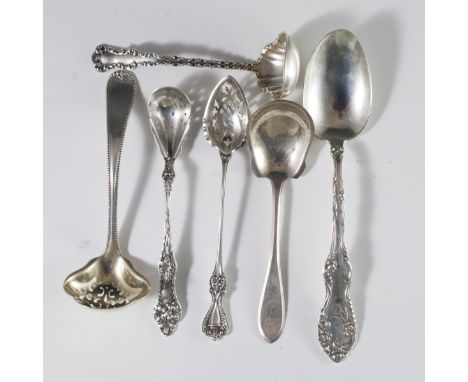 DESCRIPTION: Sterling spoon and ladle lot by Gorham, Wallace, and other American Silversmiths.CIRCA: 20thORIGIN: USADIMENSION