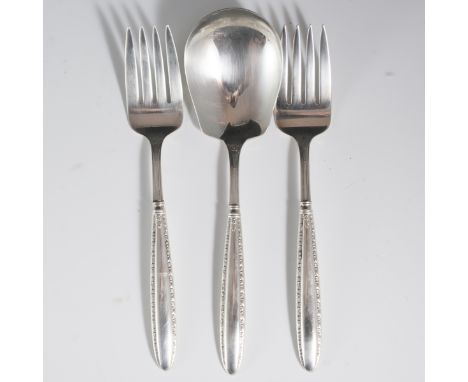 DESCRIPTION: National Silver Co. sterling serving set. Features embossed scrolling designs embellished with rosettes. Set inc