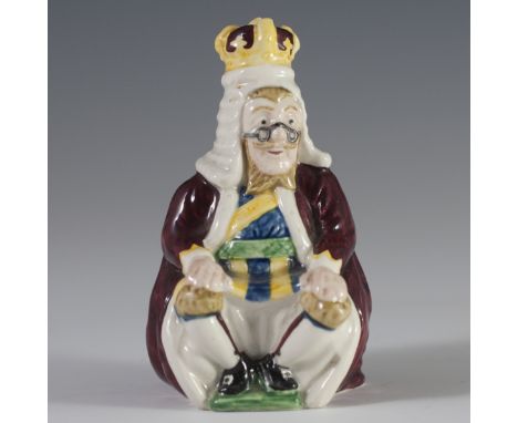 DESCRIPTION: Beswick porcelain figurine from the Alice Series of the King of Hearts. Seen here seated draped in elegant cloth