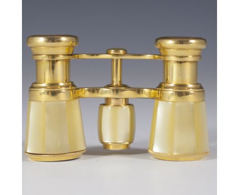 DESCRIPTION: La Boheme brass theatre glasses fitted with mother of pearl panels along the exterior of the lenses. Marked:"La 