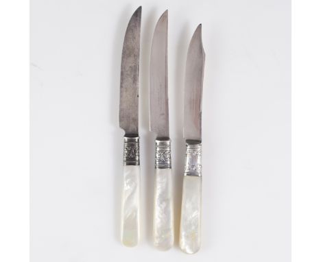 DESCRIPTION: Set of 3 Landers Frary and Clark sterling fruit knives. Features mother of pearl handles, and sterling stem conn
