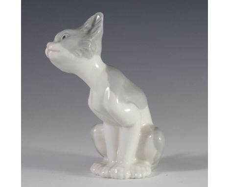 DESCRIPTION: Lladro porcelain figurine of a kitten seated, tilting its heads. Finished with a glossed glaze and marked:"Lladr