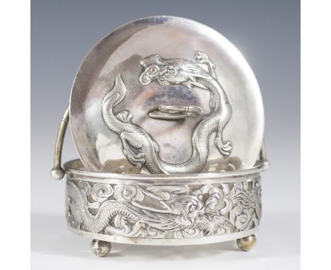 DESCRIPTION: Chinese export .850 silver lidded dish. The lid features repousse embossed dragon, swirling around the coiled ha