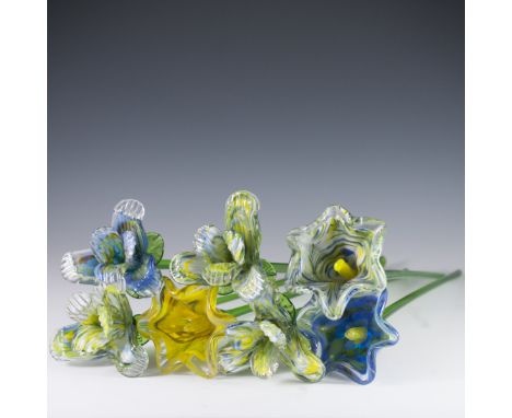 DESCRIPTION: Murano decorative glass flowers. Features green stems with swirled vibrantly hued flower pedals.CIRCA: 20th Ct.O