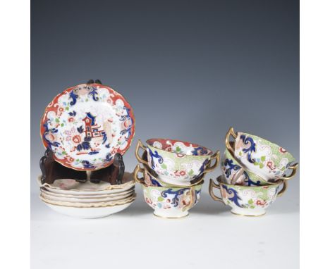 DESCRIPTION: Derby porcelain set featuring an Imari motif. Includes 6 saucers and 6 tea cups and embellished with Imari motif