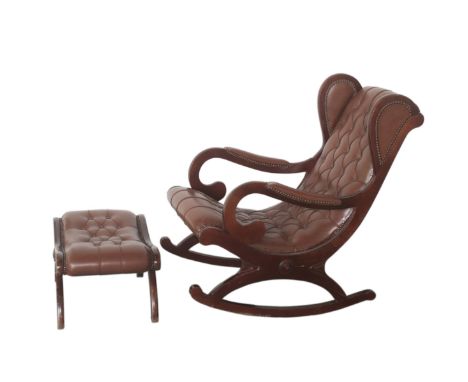 DESCRIPTION:Leather and wood rocking chair with quilted leather upholstery along the back, seat, and arms, Includes a matchin