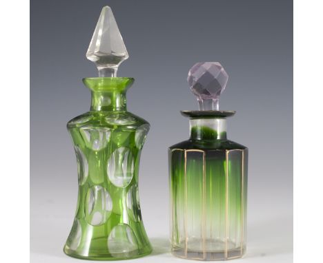 DESCRIPTION: Antique crystal perfume bottles in the manner of Val Saint Lambert. The first features a lime green hue with ova