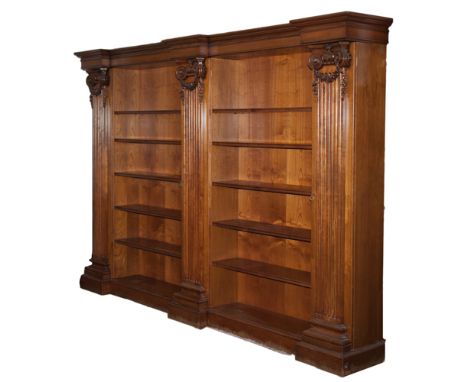 DESCRIPTION: A large hand carved, glossed antique armoire that comes with two shelving spaces, measuring 42 1/2"wide by 11 1/
