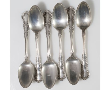 DESCRIPTION: Set of 6 R. Wallace & Sons sterling spoons. Features embossed baroque scrolled floral embellishment along the ha