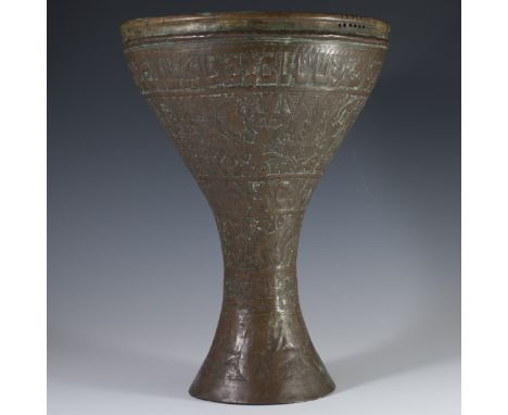 DESCRIPTION: An antique Judaic brass drum featuring  a reverse baluster shape and repousse three layers of renderings. the fi