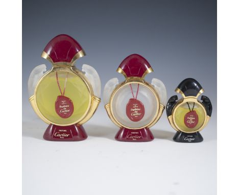 DESCRIPTION: Lot of three Panthere de Cartier atomizers. The larger is almsot full with original perfume, and features two fo