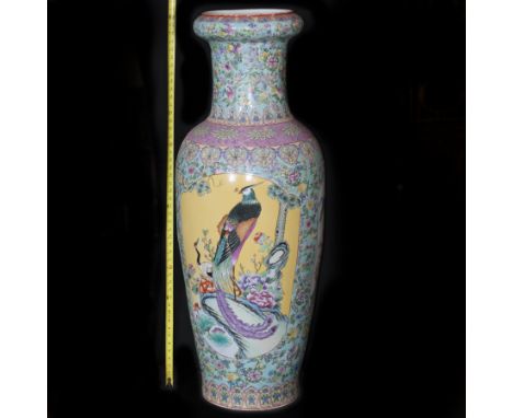 DESCRIPTION:Palace size famille rose Chinese vase. Features hand enameled depictions of blossoming flowers and swallows surro