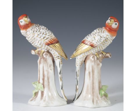 DESCRIPTION: Porcelain parrots by the "Great Imitator" Edme Samson. Features parrots resting atop tree trunks and finished wi