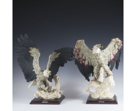 DESCRIPTION:Pair Giuseppe Armani Cappodimonte eagle figurines. Eagle is standing on top of snowed branch. This piece is Signe