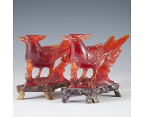 DESCRIPTION: Pressed amber figurines of two sparrows. Intricately detailed, and tails are resting atop detailed branches. Inc