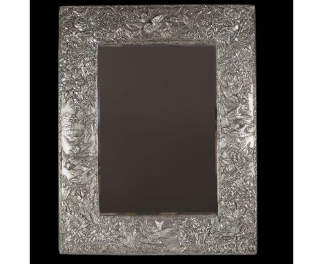 DESCRIPTION: Art Nouveau sterling mirror featuring repousse hand chased sterling overlay of birds, and an array of flowers, e
