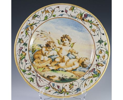 DESCRIPTION: An antique majolica dish from the Castelli Faience by the Grue Brothers. Features handpainted decoration of thre