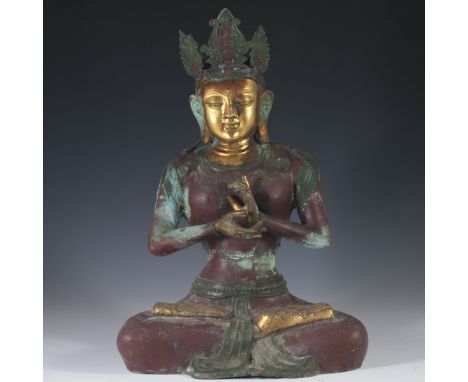 DESCRIPTION: Metallic statue of the Hindu goddess, Shiva. Seen her meditating, sitting cross legged and hand painted in green