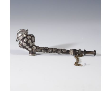 DESCRIPTION: Antique wooden pipe, ebonized into a black hue with metallic fittings and embellishment of a cow in a stable, fl