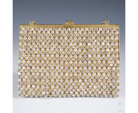 DESCRIPTION: Vintage Koret Italian nightbag. Features strung faceted iridescent beads with gilded spacers along the exterior 