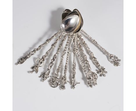 DESCRIPTION: Antique .800 silver Italian spoons featuring figural handles , lions atop banners, fleurs du lyses, crossed swor
