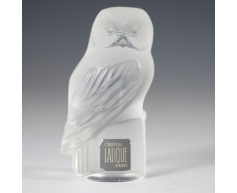 DESCRIPTION: Lalique crystal paperweight comprised of a frosted owl figurine resting atop a cylindrical base. Marked:"Lalique