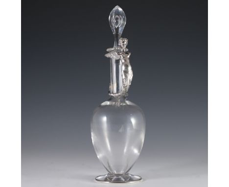 DESCRIPTION: Antique Odiot sterling and crystal decanter. Features a figural melusine handle, or winged mermaid, wrapped in o