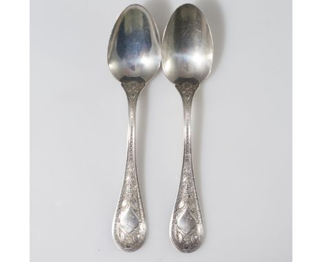DESCRIPTION:Pair of  J.H. Melluish antique sterling spoons. Features embossed floral accents enveloping the name:"Emily" on t