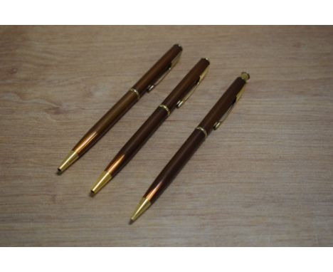 Two Parker Insignia ballpoint pens and a Propelling pencil in Laque Topaz