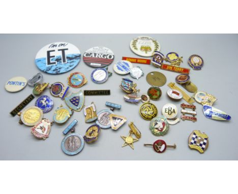 A collection of enamel and other badges including bowls, speedway and dancing 