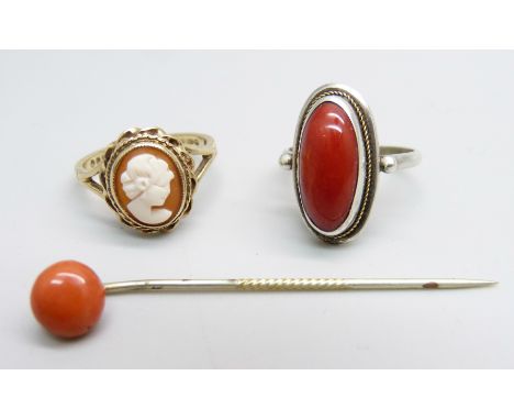 A 9ct gold cameo ring, 2.9g, M, a silver and coral ring, M, and a coral stick pin 