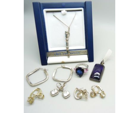 A collection of silver jewellery; earrings, a pendant on a chain, an amethyst pendant and a ring 