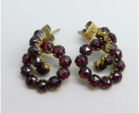 A pair of vintage garnet set earrings 