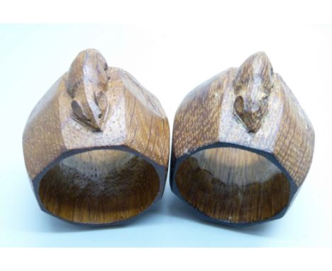 Two carved oak Mouseman napkin rings 