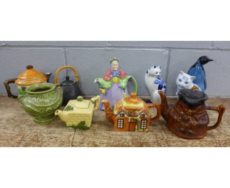 A collection of ceramics including Burleigh ware, a Poole Pottery penguin, Delft cat, etc. **PLEASE NOTE THIS LOT IS NOT ELIG