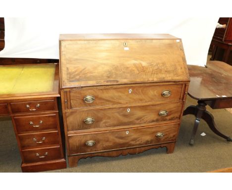 A George III inlaid mahogany fitted bureau with ivory escutcheon's and bracket feet, 106cm by 51cm by 111cm 