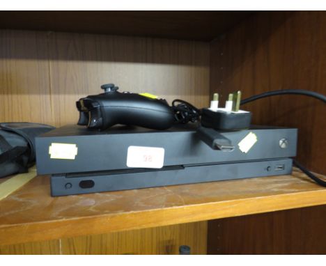 MICROSOFT XBOX ONE X GAMES CONSOLE WITH ONE WIRELESS CONTROLLER.