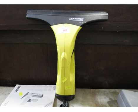 KARCHER WV50 WINDOW CLEANER WITH HARGER AND MANUAL.