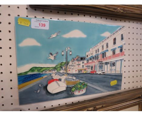 CERAMIC WALL PLAQUE DEPICTING A SEAFRONT.