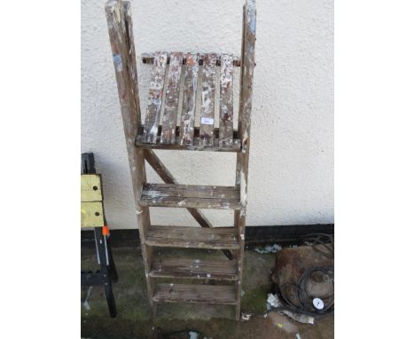 A WOODEN FOUR TREAD STEP LADDER. (AF)