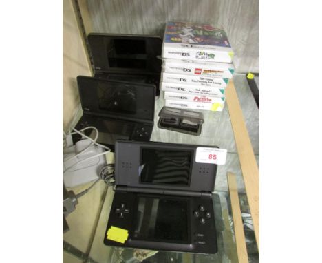 NINTENDO DS LITE HANDHELD CONSOLE, NINTENDO DS I CONSOLE AND A NINTENDO DS I XL CONSOLE. TOGETHER WITH CHARGERS AND SIX GAMES