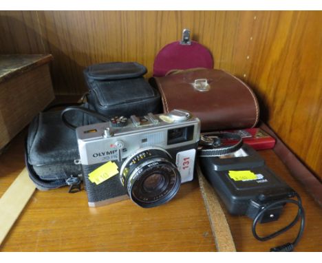 AN OLYMPUS 35 RC FILM CAMERA, CANON FILM CAMERA, PAIR OF CARL ZEISS BINOCULARS, TOGETHER WITH A PANASONIC MP3 PLAYER.